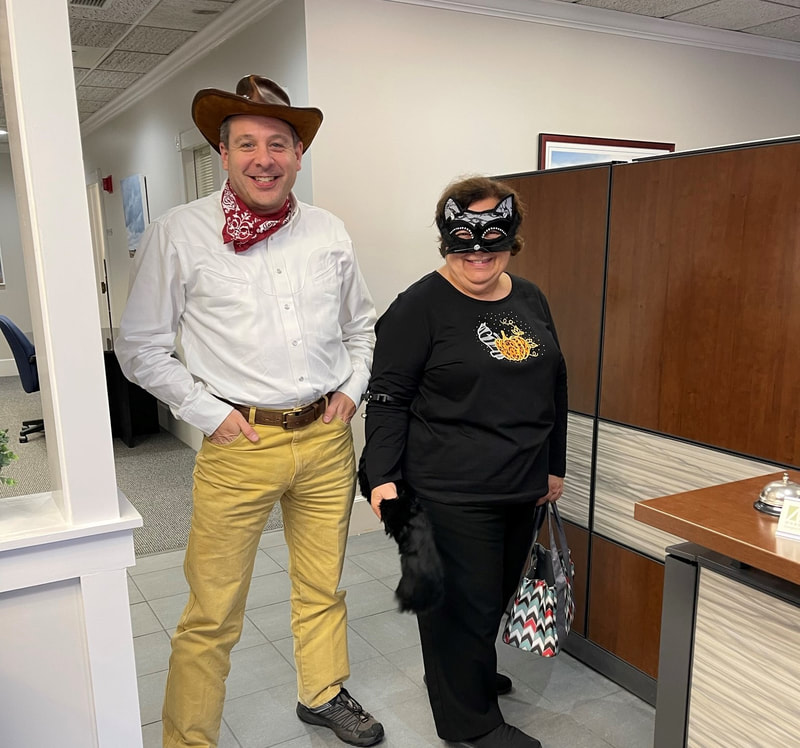 Adam dressed as a cowboy, and Brenda dressed as a very sassy cat! 